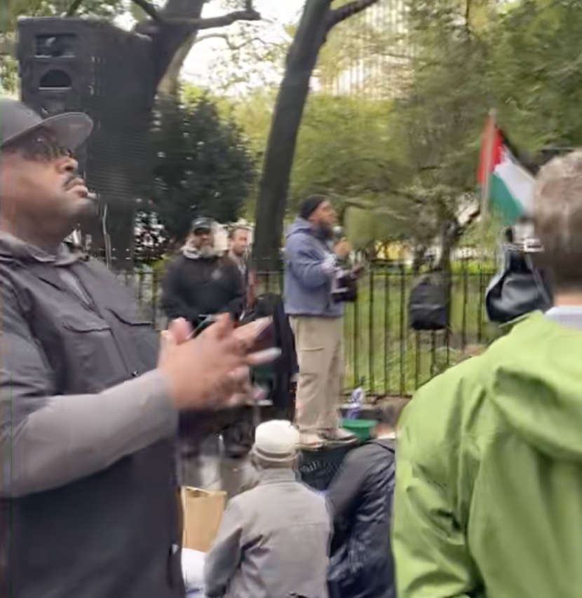 NYC POLICE ABUSE PEDESTRIANS AS PRO-HAMAS DEMONSTRATORS DRESSED IN WAR GEAR CONDEMN AMERICA OUTSIDE CITY HALL