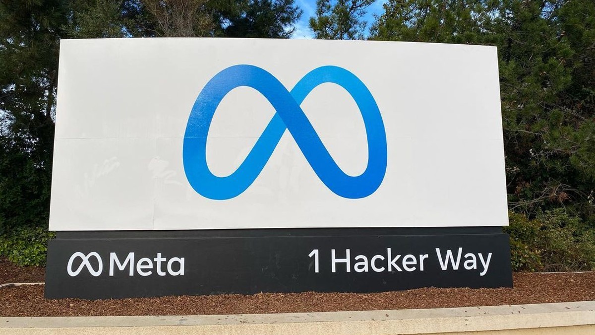 Meta headquarters entrance sign at 1 Hacker Way in Menlo Park, California